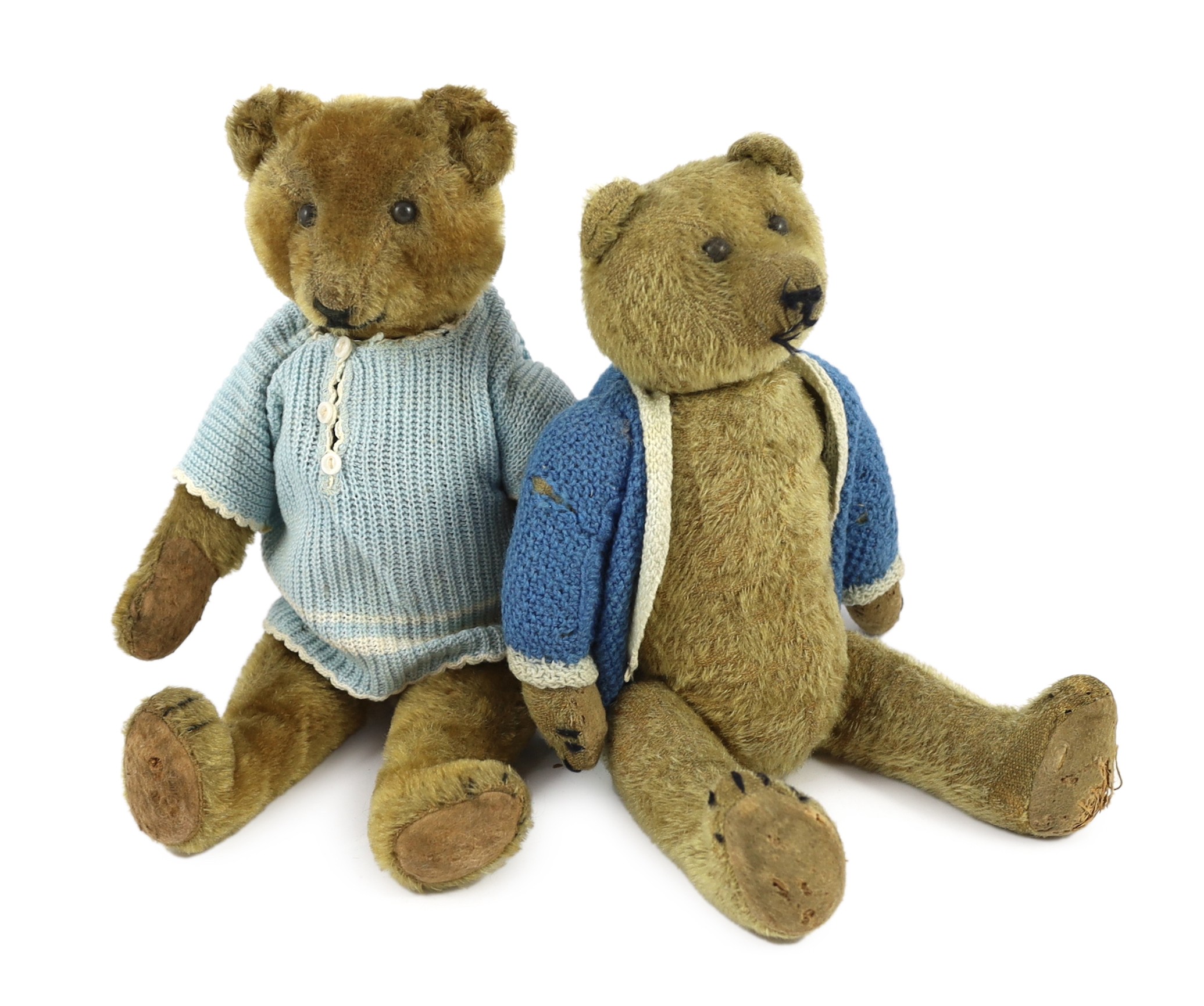 Two Gebruder Bing Teddy bears, German, circa 1920, gold mohair plush with boot-button eyes, stitched snouts and jointed limbs, both 15in.